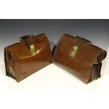 An early 20th Century brown leather brief case with brass fittings, width 41cm, together with a