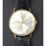A Tudor Royal 9ct gold circular cased gentleman's wristwatch, the signed circular silvered dial with