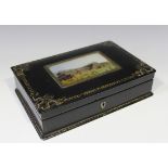 An early Victorian papier-mâché rectangular box, the hinged lid inset with a glazed reverse print of