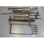 A group of late 19th and early 20th century gardening tools, including a Sisis Aerdrain fork, a