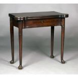 A George II red walnut fold-over card table, the hinged top with rounded projecting corners above