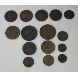 A group of British copper coins, comprising a George III penny 1807, a halfpenny 1807 and a farthing