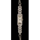 An Art Deco platinum cased and diamond set lady's dress wristwatch with an unsigned Swiss jewelled