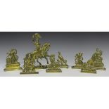 A collection of eight Victorian cast brass mantelpiece figures, one of a cavalryman, height 20cm,