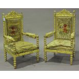 A pair of mid-19th century giltwood and gesso showframe armchairs, the carved foliate top rails