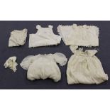 A group of three late 19th century cotton and silk christening gowns, all profusely embroidered with