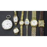 A 9ct gold octagonal cased lady's wristwatch on a sprung gilt metal bracelet, five further ladies'