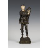 Didier Debut - 'Barde', a late 19th century French brown patinated cast bronze and carved ivory