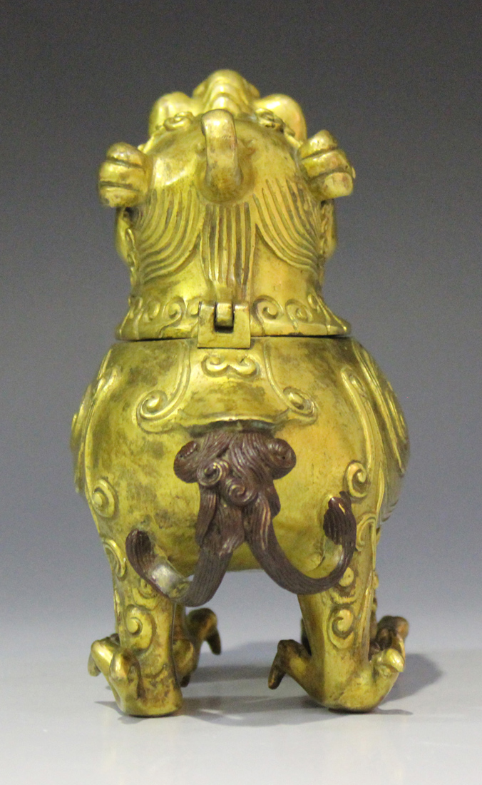 A Chinese cast gilt bronze incense burner in the form of a chimera, mark of Yongzheng but probably - Image 6 of 7