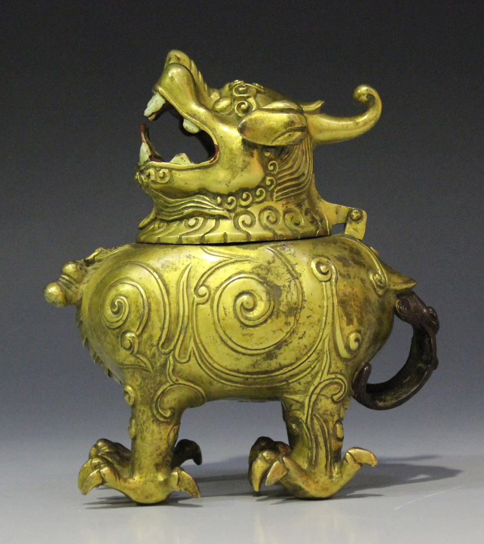 A Chinese cast gilt bronze incense burner in the form of a chimera, mark of Yongzheng but probably - Image 5 of 7