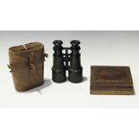 A pair of 'The Official Bisley' binoculars, within a leather travelling case, together with a