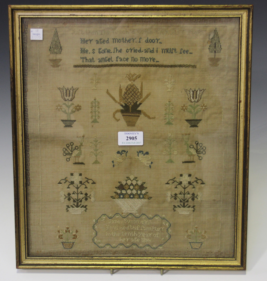 A George III needlework sampler by Jane Summer, dated 1814, the four lines of verse above plants and