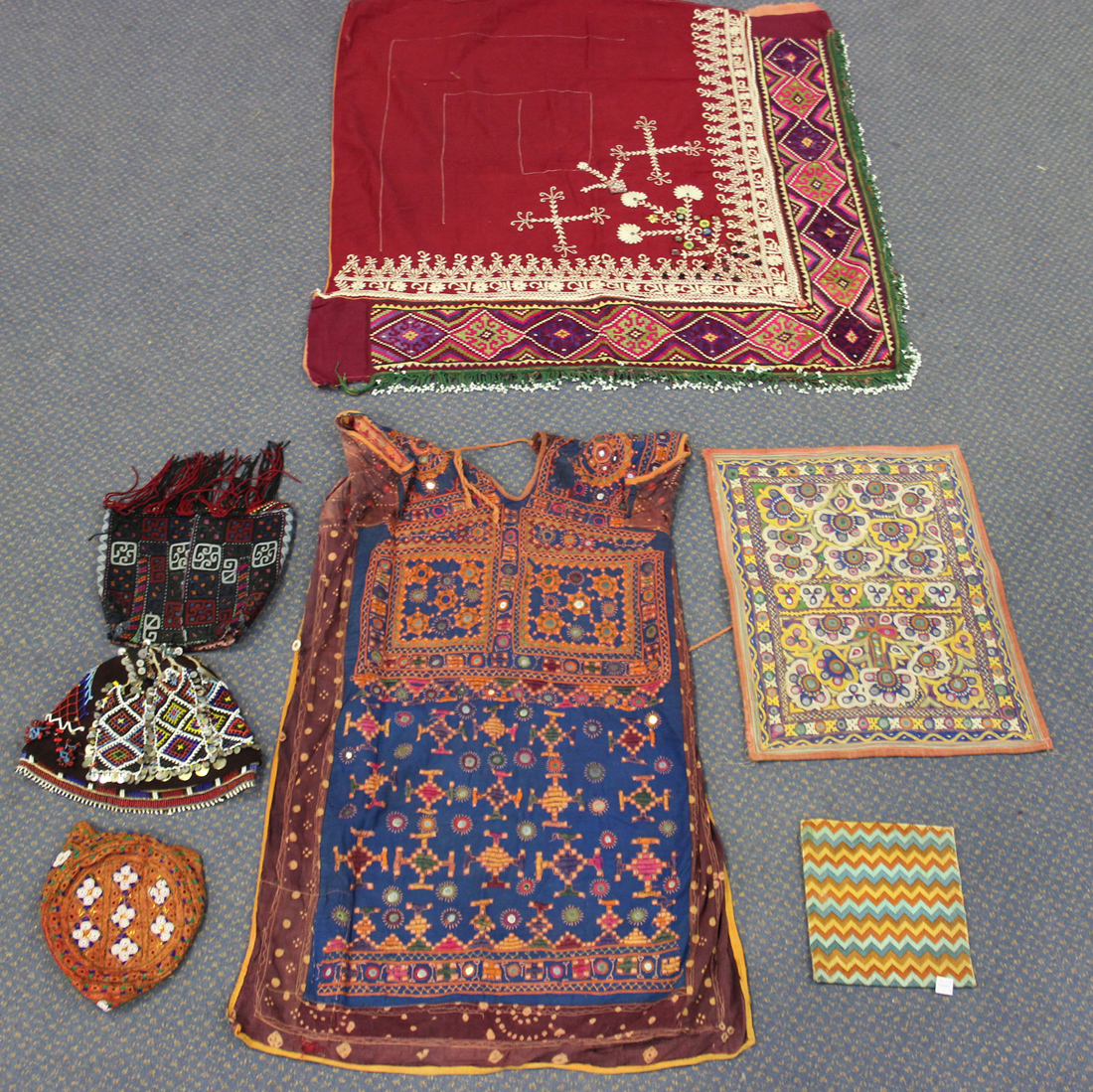 A quantity of mostly 20th century Indian needlework textiles, including clothing and embroidered - Image 2 of 4