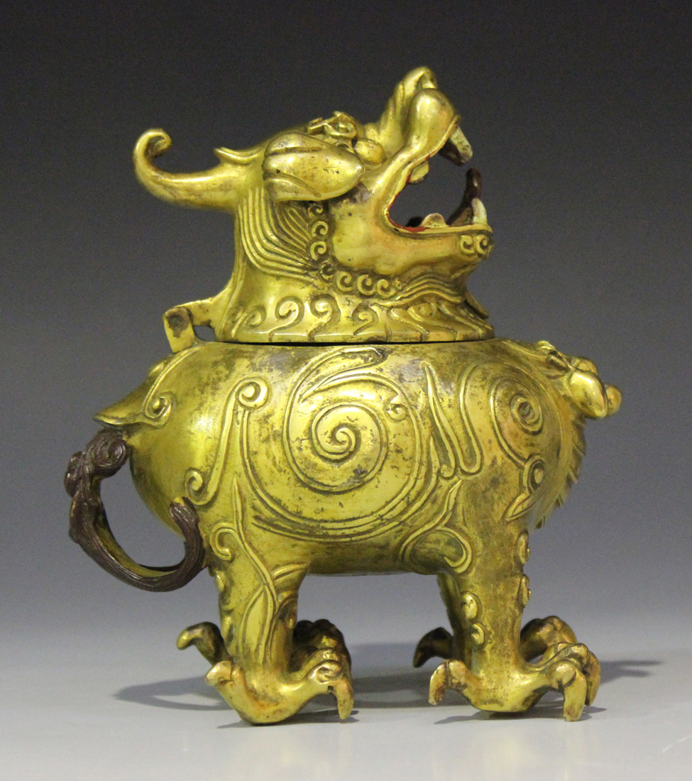 A Chinese cast gilt bronze incense burner in the form of a chimera, mark of Yongzheng but probably - Image 7 of 7