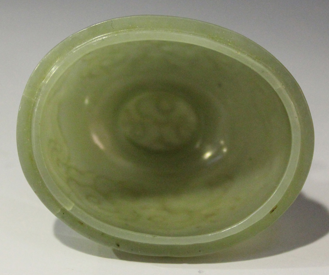 A Chinese celadon jade pear form vase and cover, late Qing dynasty, finely hollowed and carved in - Image 7 of 8