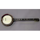 A late 19th/early 20th century five string banjo by Barnes & Mullins, London, the sides and back