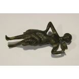 A cast bronze figure of a semi-clad classical lady, possibly Greek or Roman, modelled holding a