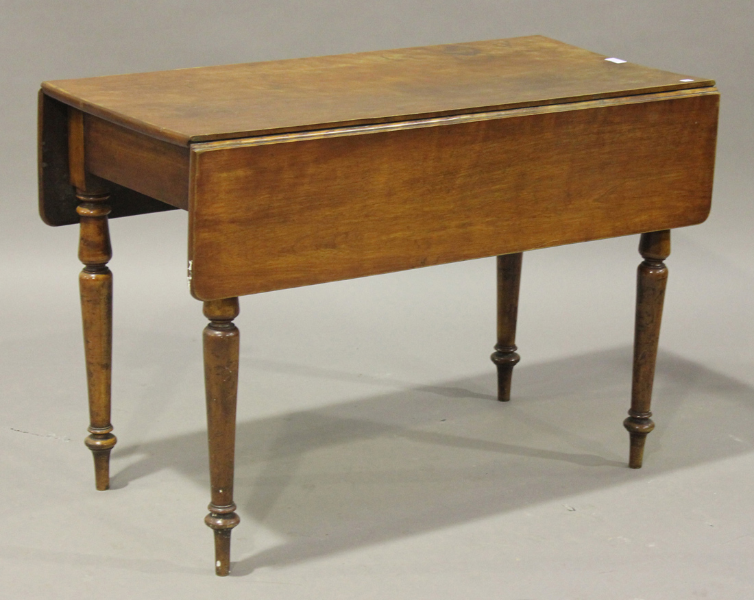 A Victorian mahogany Pembroke table, fitted with a frieze drawer, on turned legs, height 72cm, width