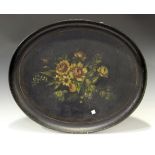 A Victorian papier-mâché oval tea tray with painted floral decoration, length 72cm.