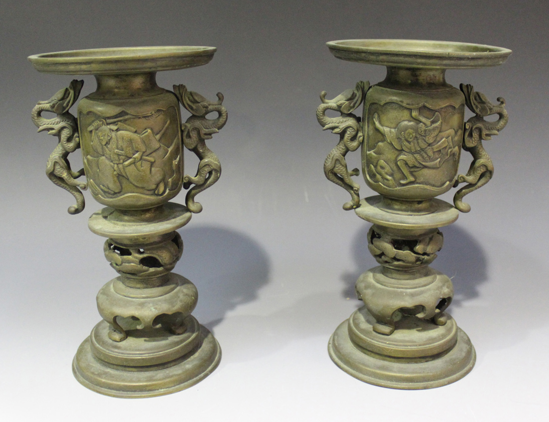 A pair of Japanese bronze incense burners, Meiji period, each pan top above cast figural panels, - Image 2 of 3