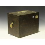 An Edwardian oak and brass bound silver chest, the sides fitted with recessed handles, height