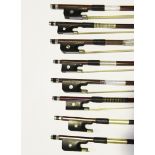 A collection of twenty-five various violin, viola and bass bows, some student examples.