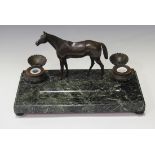 A late 19th century brown patinated cast bronze and green veined marble equestrian desk standish,