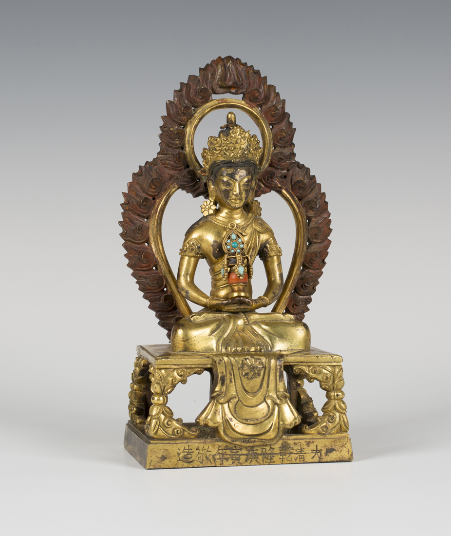 A Sino-Tibetan gilt bronze figure of Amitayus, mark of Qianlong but probably later, modelled