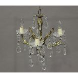 A mid-20th century gilt metal and clear glass ceiling light, width 40cm, together with a pair of