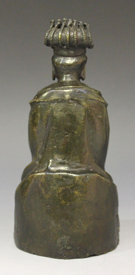 A Chinese brown patinated bronze figure of a seated female official, late Ming dynasty, modelled - Image 3 of 6