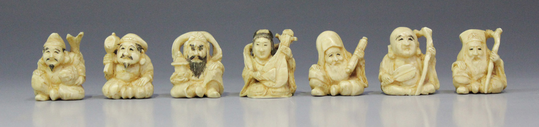 A set of Japanese ivory okimono figures of the Seven Gods of Good Fortune, Meiji period, each