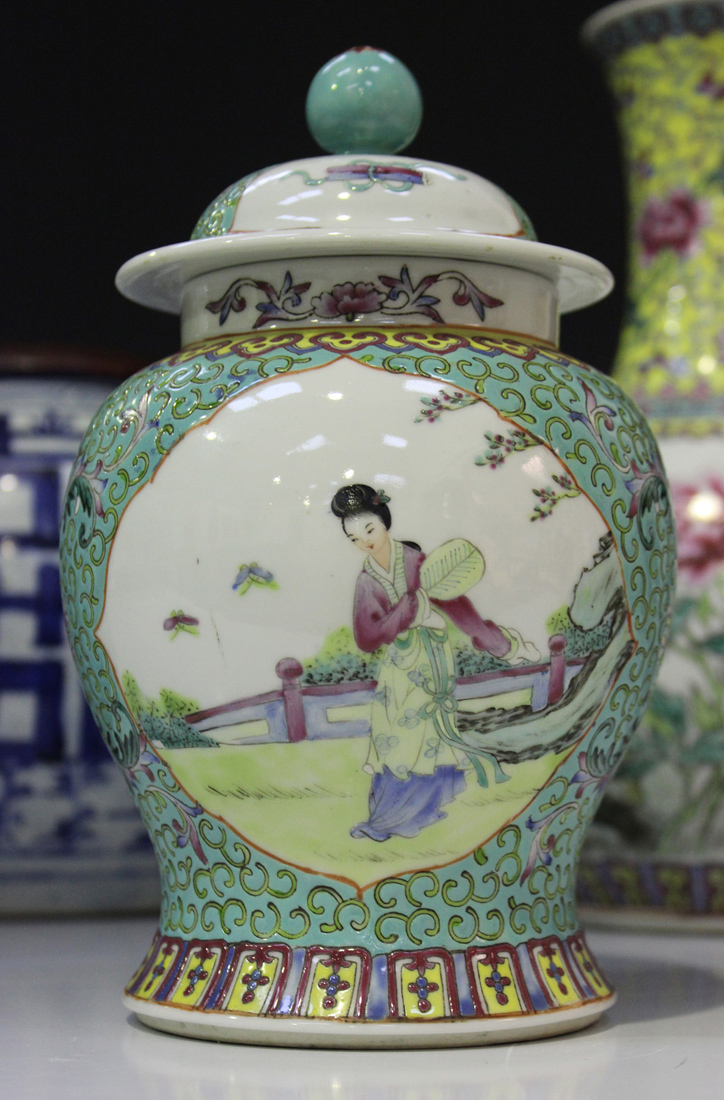 A Chinese famille rose porcelain bottle vase, mark of Qianlong but 20th century, decorated with - Image 2 of 4