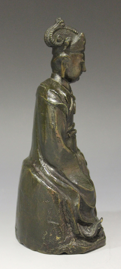 A Chinese brown patinated bronze figure of a seated female official, late Ming dynasty, modelled - Image 2 of 6