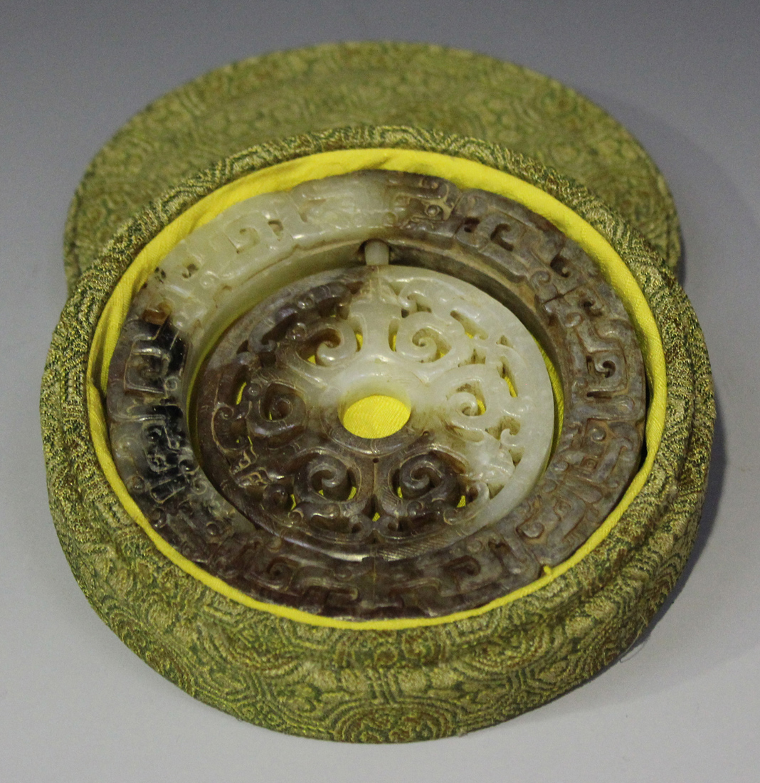 A Chinese archaistic jade two-section bi (disc), probably 20th century, the outer ring carved in