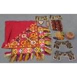 A quantity of mostly 20th century Indian needlework textiles, including clothing and embroidered