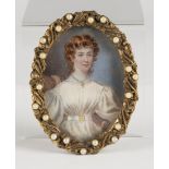British School - Oval Miniature Portrait of a Lady with Auburn Hair seated in a Chair, watercolour