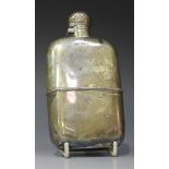 An Edwardian silver hip flask with hinged lid and detachable cup, Sheffield 1905 by James Dixon &