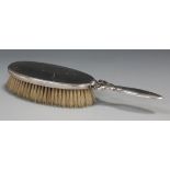 A Georg Jensen silver clothes brush, designed by Harald Nielsen, the handle with stylized leaves,