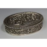 A late 20th century Portuguese .835 silver oval box and cover, the hinge lid decorated in relief