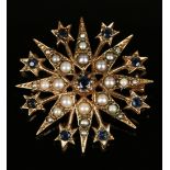 A 9ct gold, sapphire and cultured pearl brooch in a starburst design, mounted with the principal