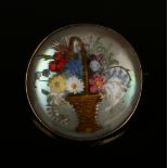 A gold mounted, reverse painted intaglio crystal circular brooch, designed as a basket of flowers,