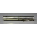 A silver novelty torch in the form of a fountain pen, Birmingham 1940, length 12.8cm (part missing).