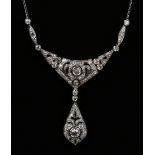 A white gold and diamond necklace, the front with a pear shaped pendant drop, centred by the