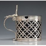 A George III silver cylindrical mustard, the hinged lid with banded rim, the sides pierced with