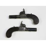 A pair of 44 bore percussion boxlock pistols by Dunderdale Mabson & Labron with blued turn-off