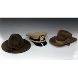 A modern U.S. Marine Corps campaign hat, unused condition, together with a slouch hat by Wilson &