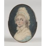 A. Charles - Oval Miniature Portrait of a Lady wearing a White Cap with Blue Band and High-necked