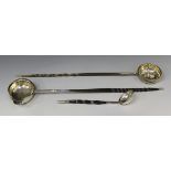 A George III silver punch ladle, the circular bowl inset with an Elizabeth I sixpence 1576, fitted
