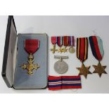 An O.B.E., civil issue, with the original Royal Mint case, a 1939-45 Star, a Burma Star, a 1939-45