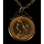 A Victoria Old Head sovereign 1900S in a 9ct gold pendant mount with a multiple link neckchain.